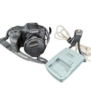 Canon PowerShot SX530 HS 16MP Digital Camera 50x Zoom Bundle Charger Tripod